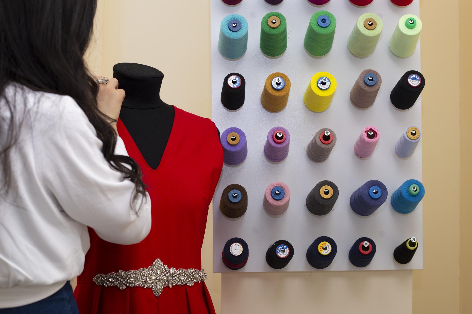 Studio entrance with embroidered samples