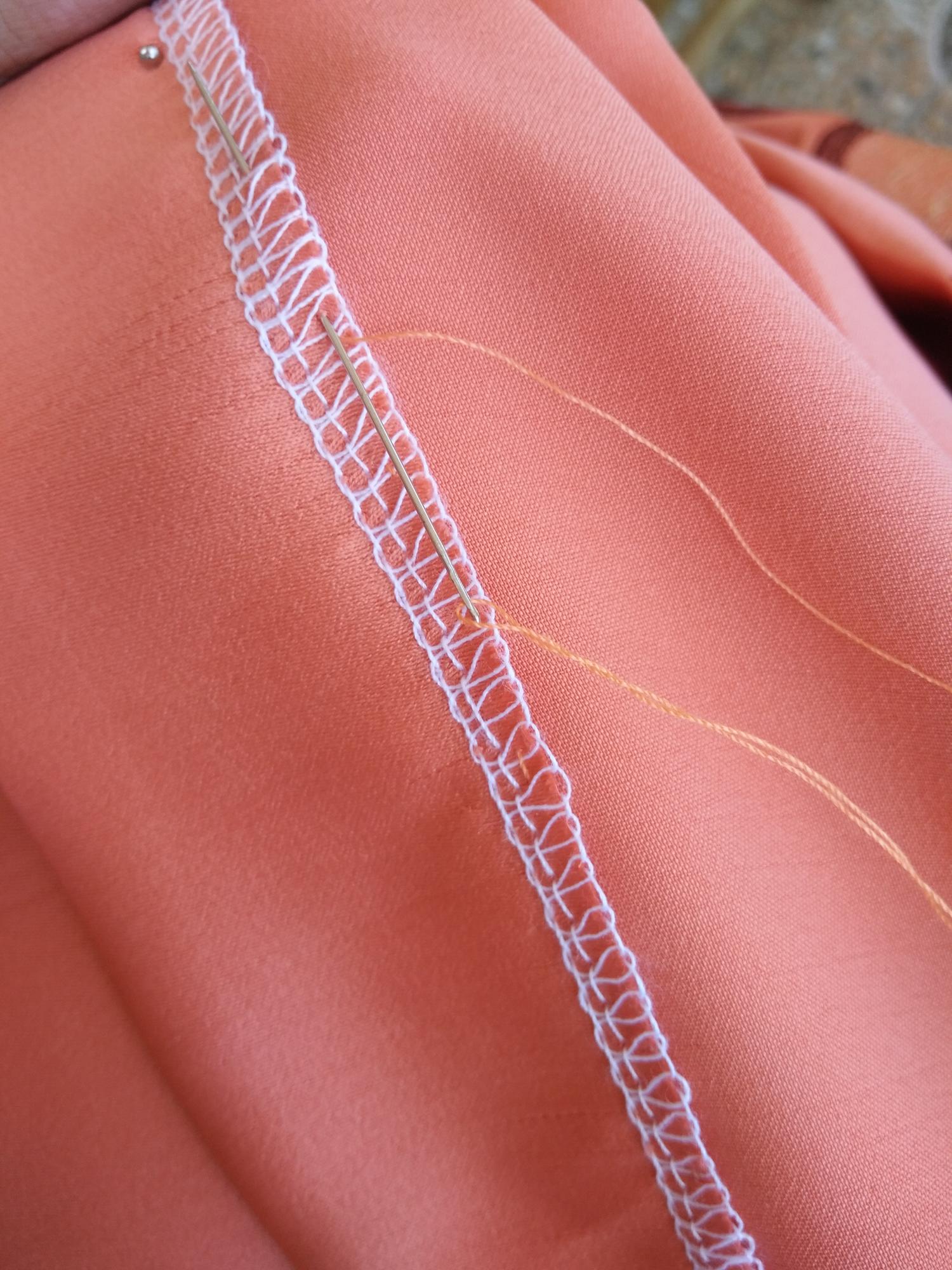 Close detail of satin stitches on fabric